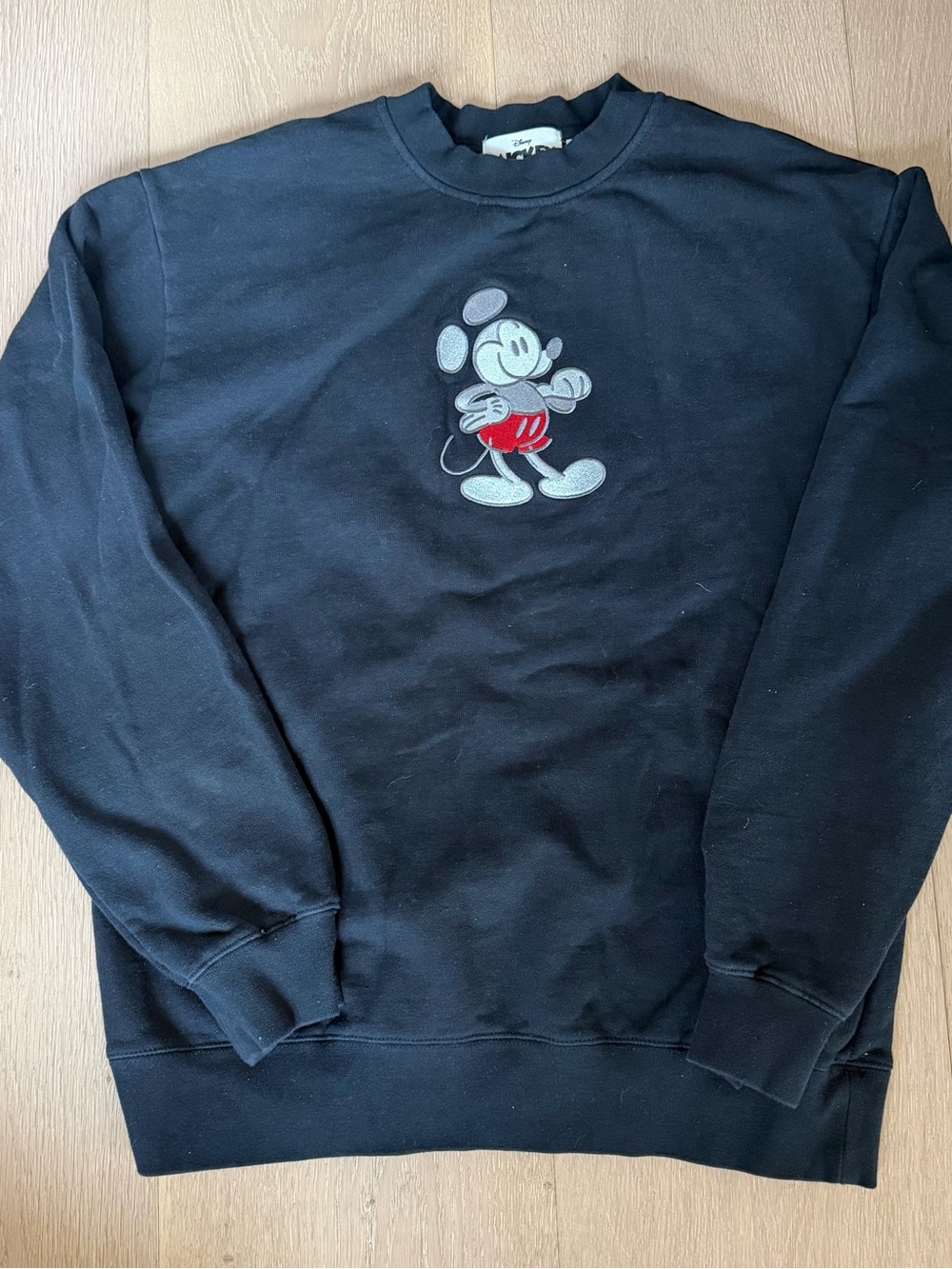 Disney Black Crewneck with Red-Accented Mickey Graphic